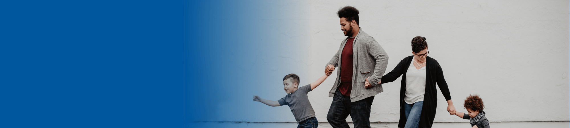family holding hands walking together
