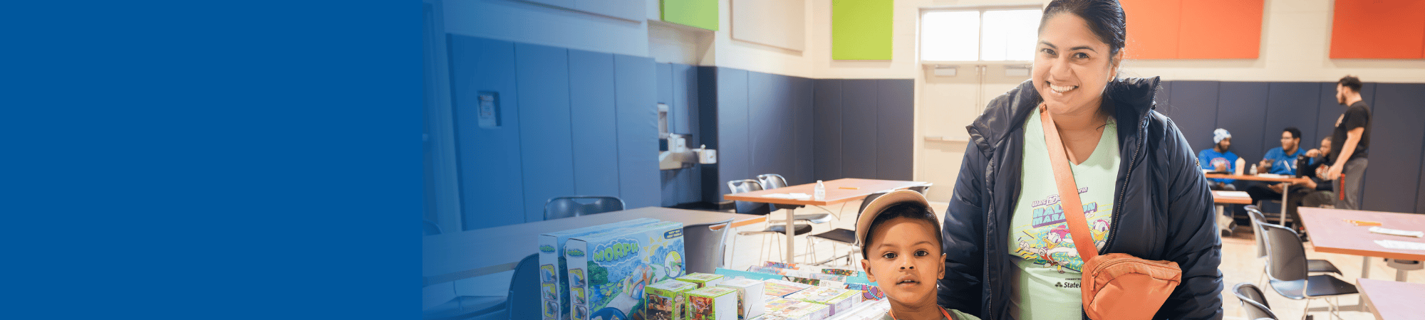 Mom and son smiling at school fair